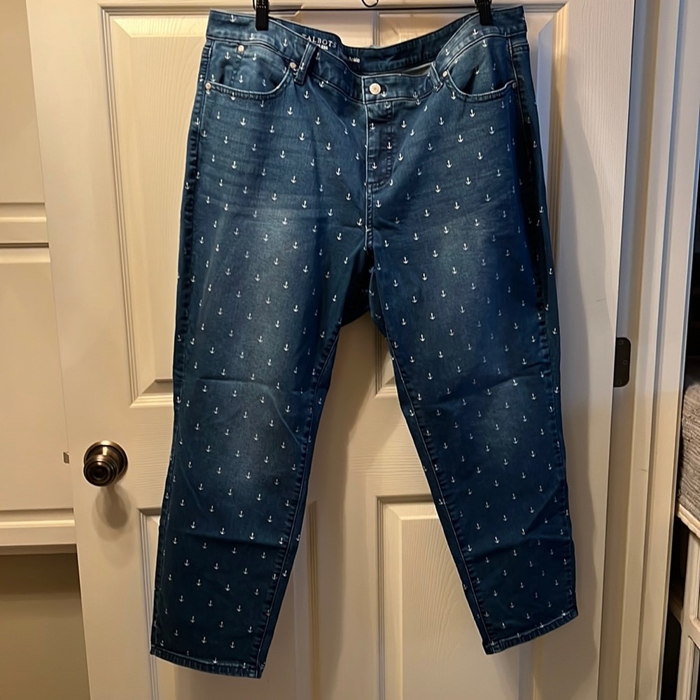 Jeans with little anchors on them